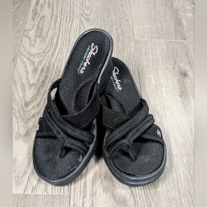 Worn Skechers Black Criss-Cross Wedge Sandals